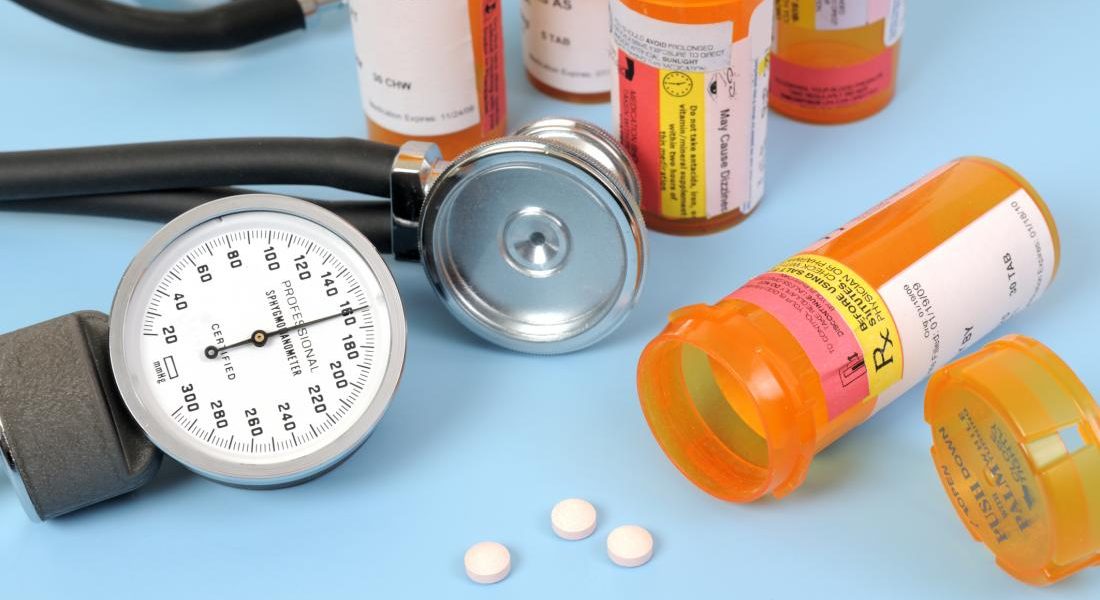 bottles-of-pills-with-a-stethoscope-and-blood-pressure-meter